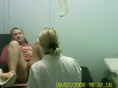 Hidden web camera movie of golden-haired lady on the gynecologist chair in the hospital 